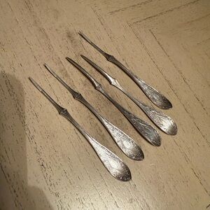 Silver plated set of 5 nut picks from Lorne pattern in 1878 by Rogers bros.